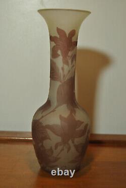 Acid-etched glass vase decorated in Art Nouveau style with iris flower