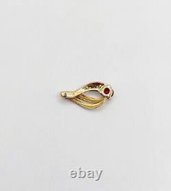 Art Nouveau style pendant in 18k gold adorned with a vintage ruby and diamond