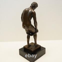 Solid bronze sculpture of a sexy style athlete in Art Deco and Art Nouveau style.