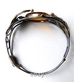Solid silver and Art Nouveau style amber bracelet.
