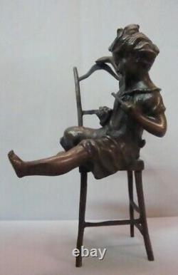 Statue Sculpture of a Girl Sitting in an Art Deco Style Chair in Art Nouveau Style Bronze