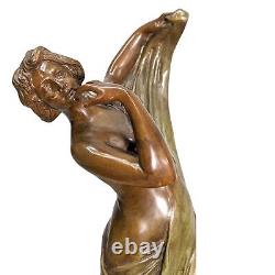 Young girl draped in bronze in the Art Nouveau style with a double green patina.