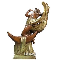 Young girl draped in bronze in the Art Nouveau style with a double green patina.