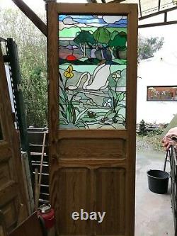 Porte en pin avec vitrail paysage style art nouveau