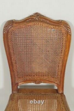 Six chaises cannées style Louis XV noyer