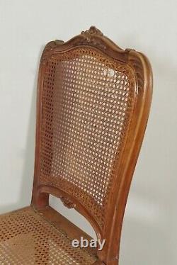 Six chaises cannées style Louis XV noyer