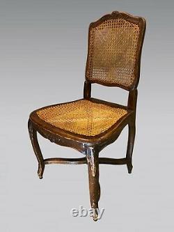 Six chaises de salle à manger cannées style Louis XV