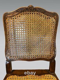 Six chaises de salle à manger cannées style Louis XV
