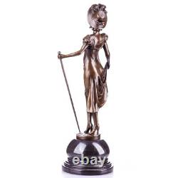 Vintage Figure of a lady with walking stick made of a bronze style Art Nouveau